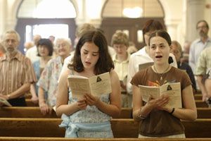 The congregation sings chant