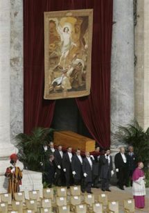 The coffin is borne into Saint Peter's Square